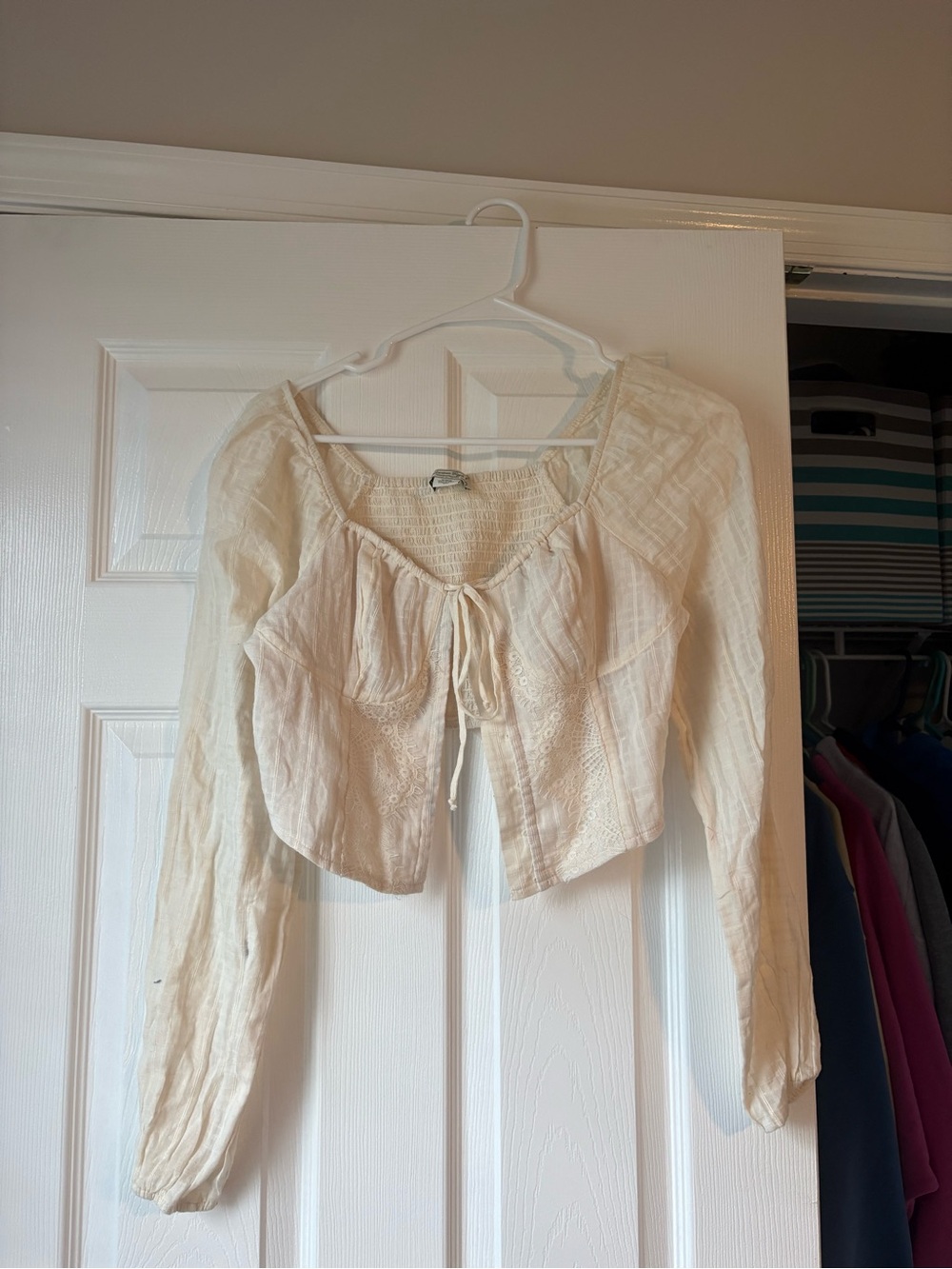 Cream AE cropped long sleeve top